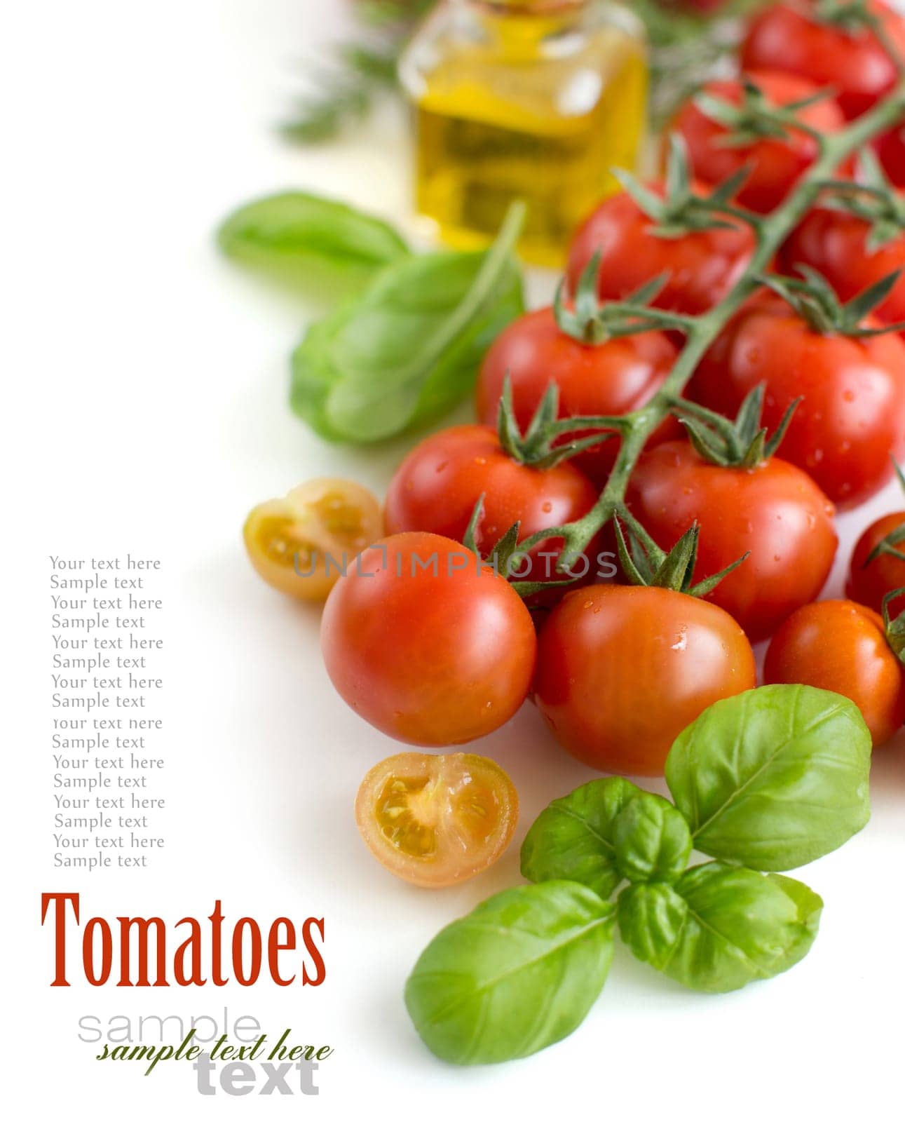 Cherry tomatoes and basil isolated on white background