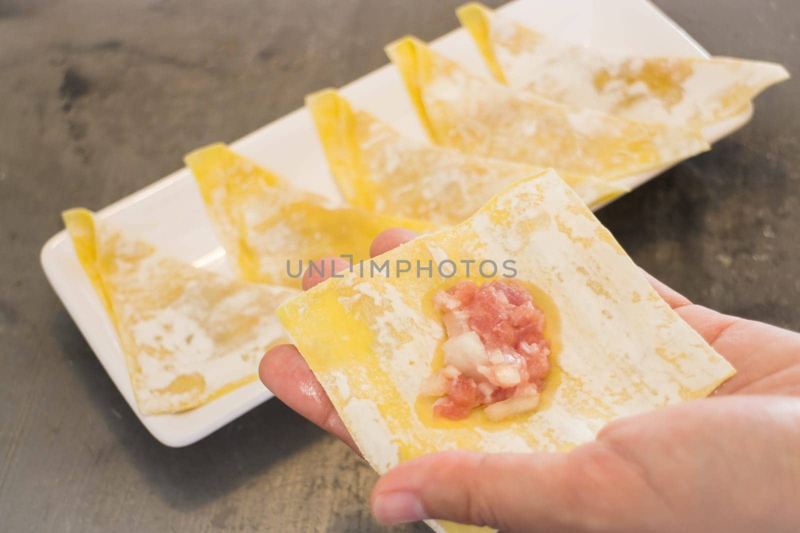 Ready to casting of homemade stuffed dumplings, stock photo