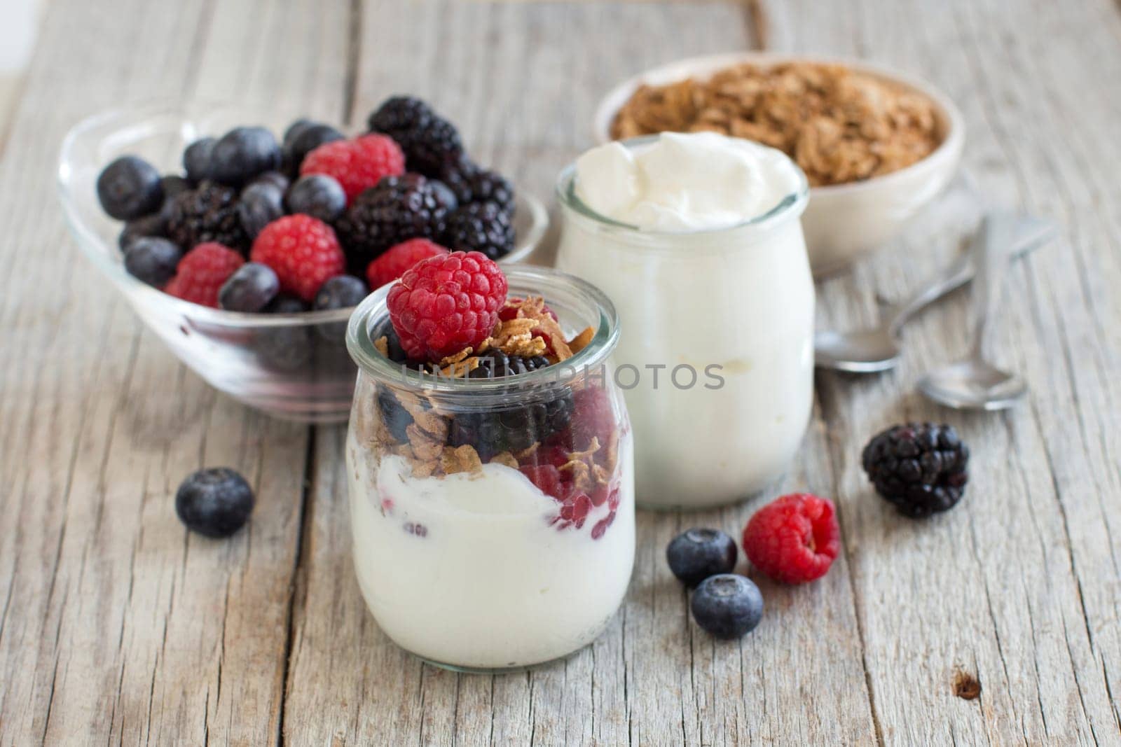 Healthy breakfast with Fresh greek yogurt, muesli and berries