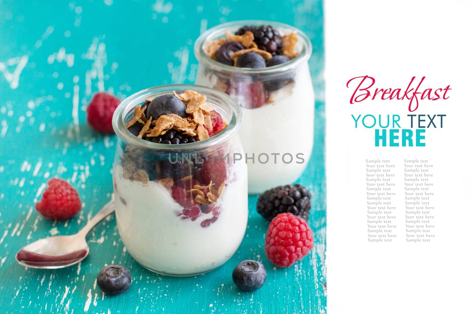 Berries, flakes and fresh greek yogurt in a jar