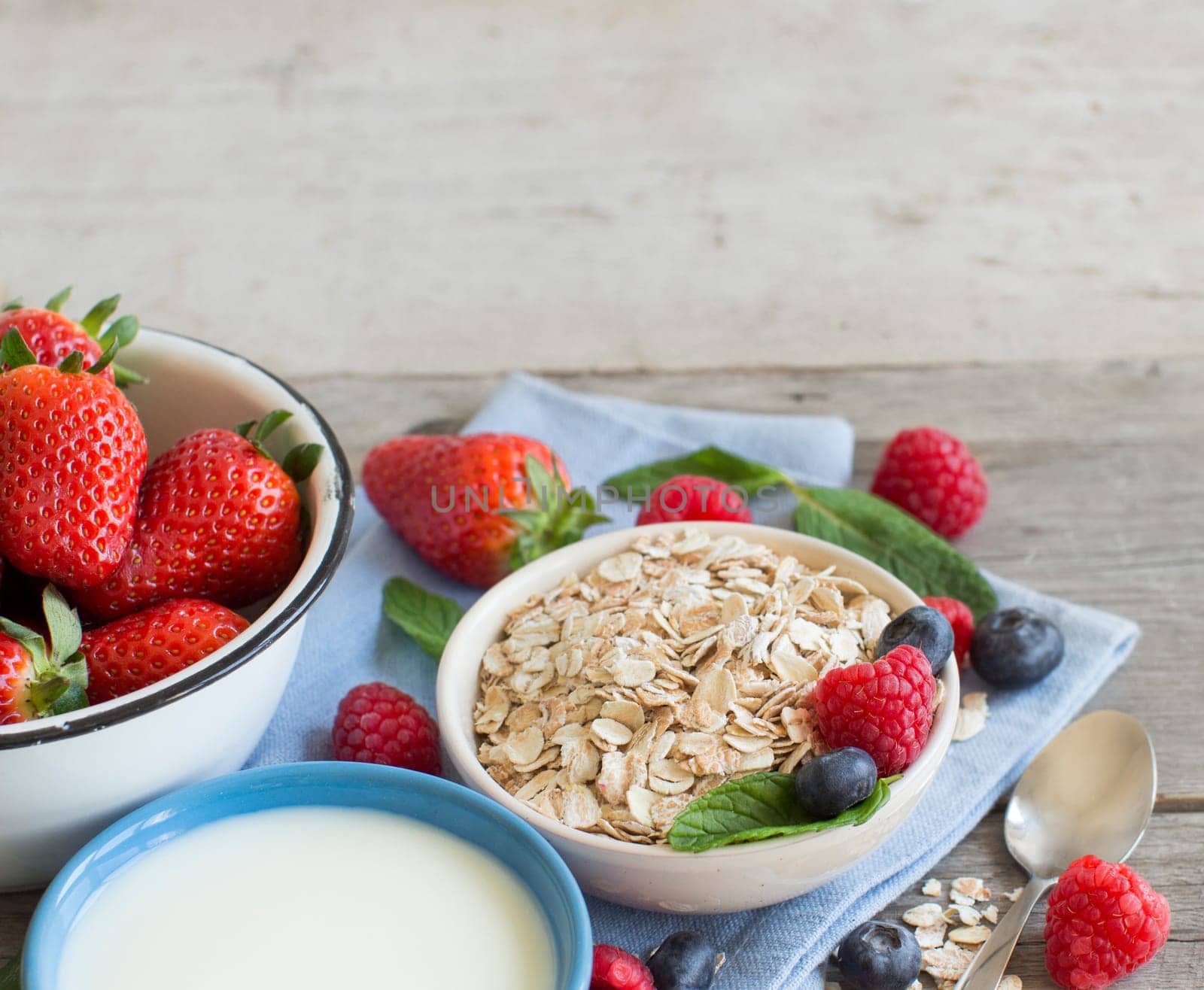 Healthy breakfast with Fresh greek yogurt, muesli and berries