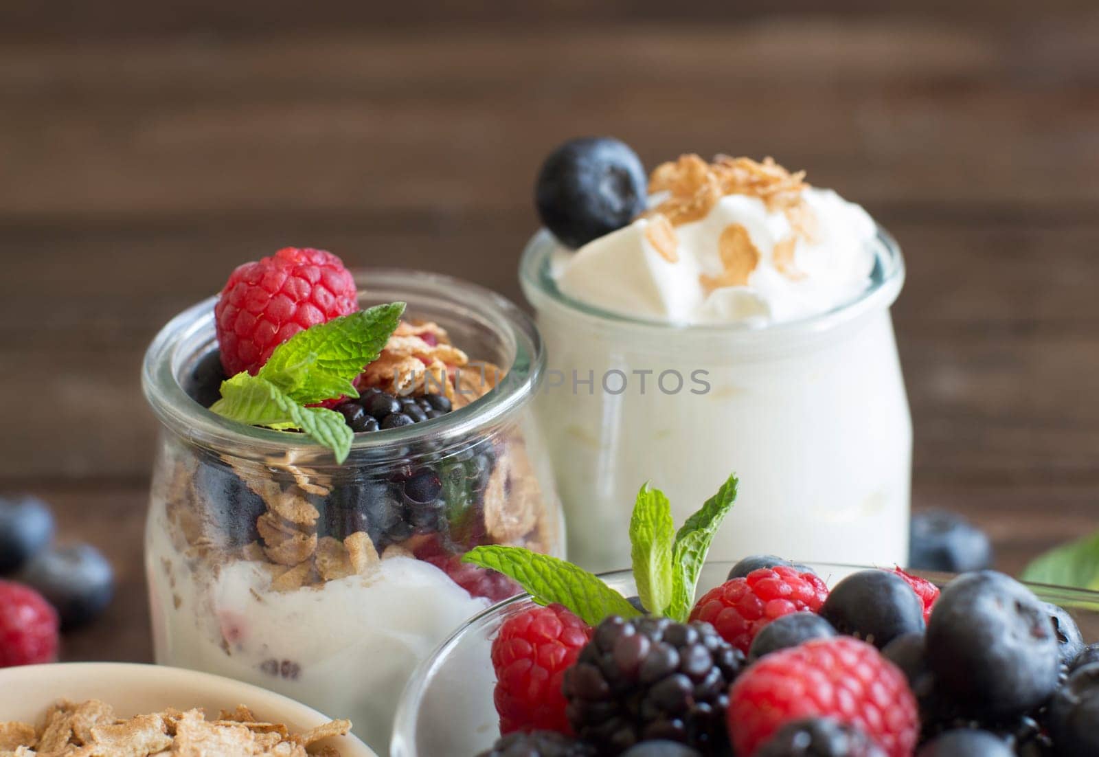 Healthy breakfast with Fresh greek yogurt, muesli and berries