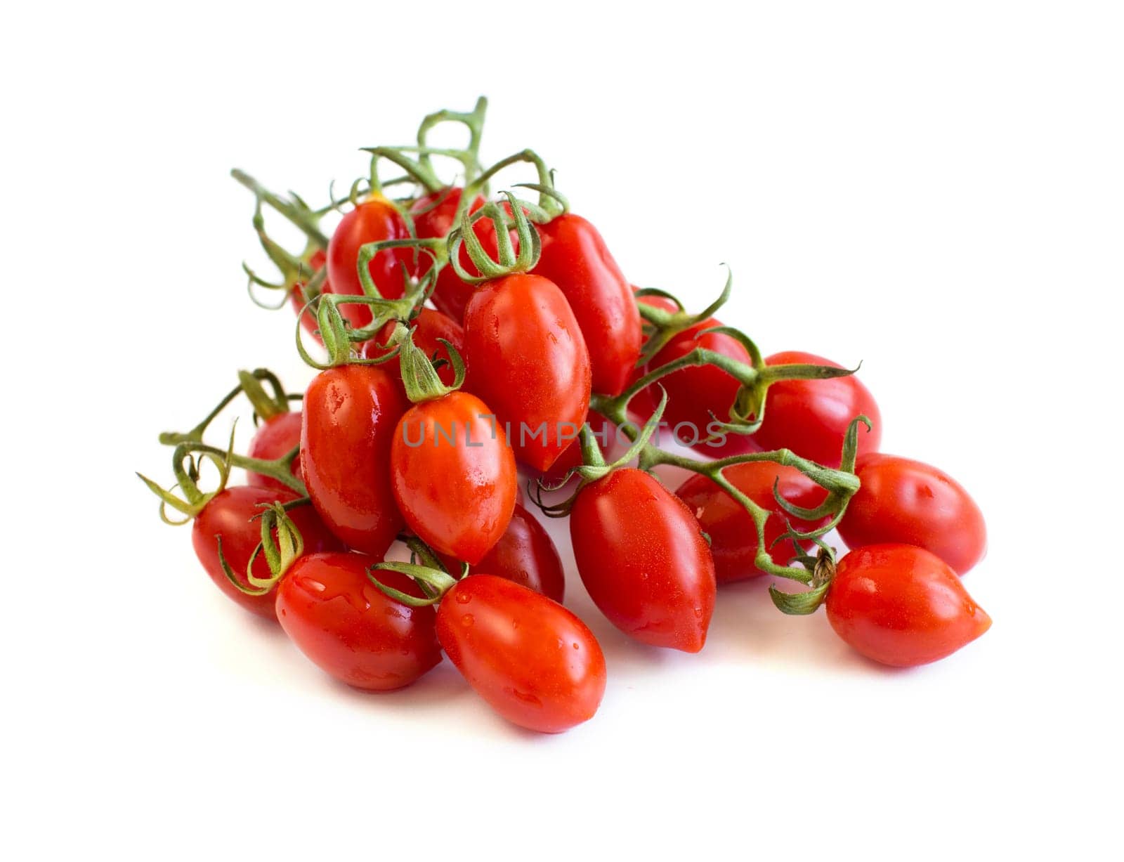Fresh cherry tomatoes isolated on white background