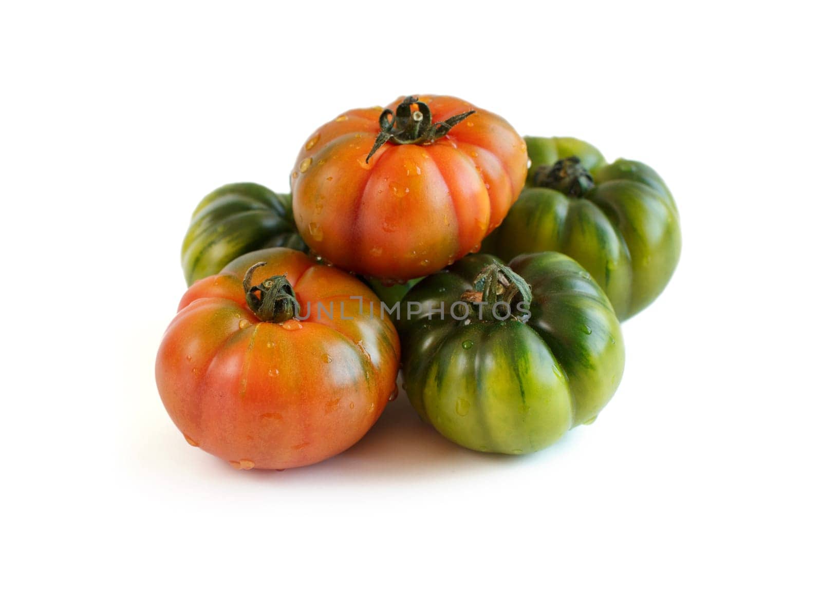 Fresh red and green costoluto tomatoes isolated on white background