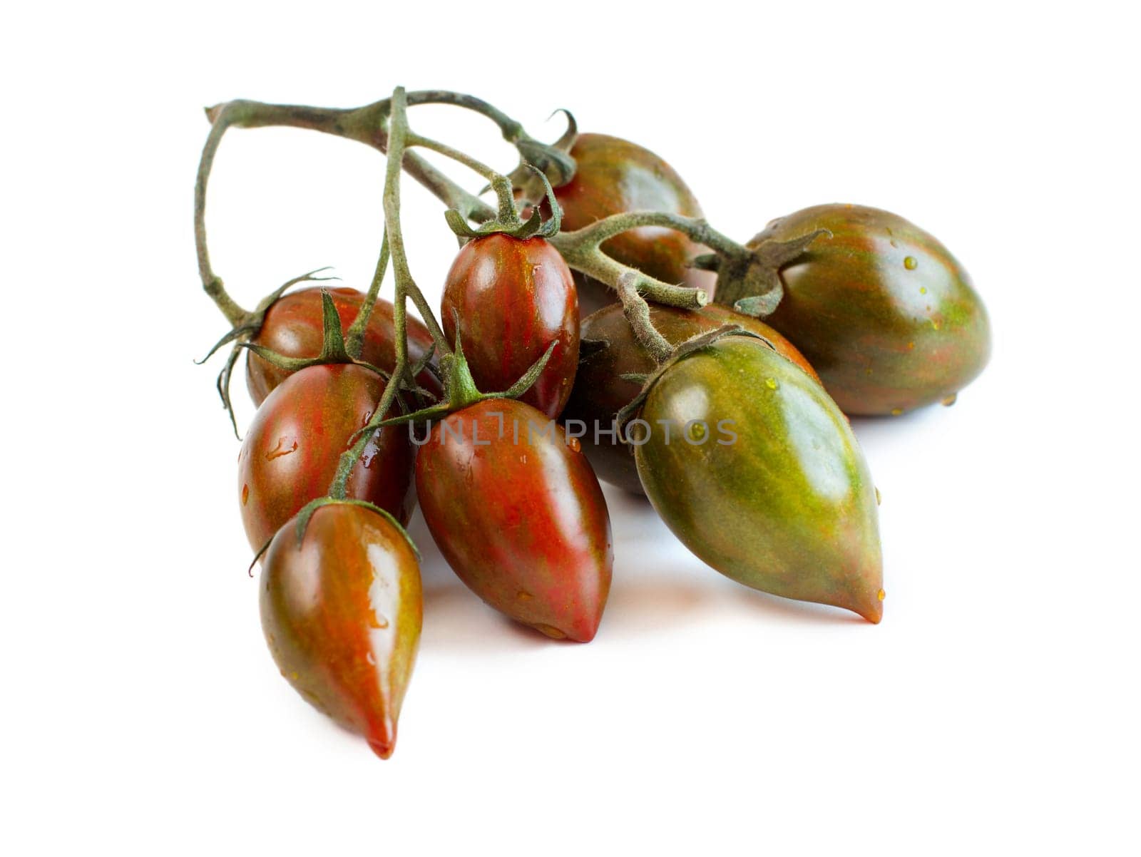 Fresh black cherry tomatoes isolated on white background