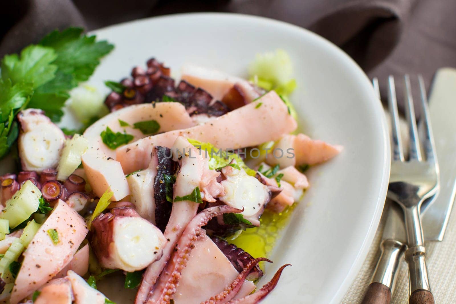 Seafood salad made of different seafood and vegetables