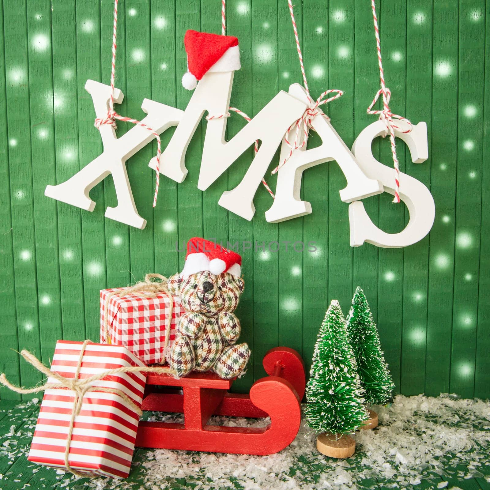 Small gifts for Christmas with XMAS lettering on Gruen