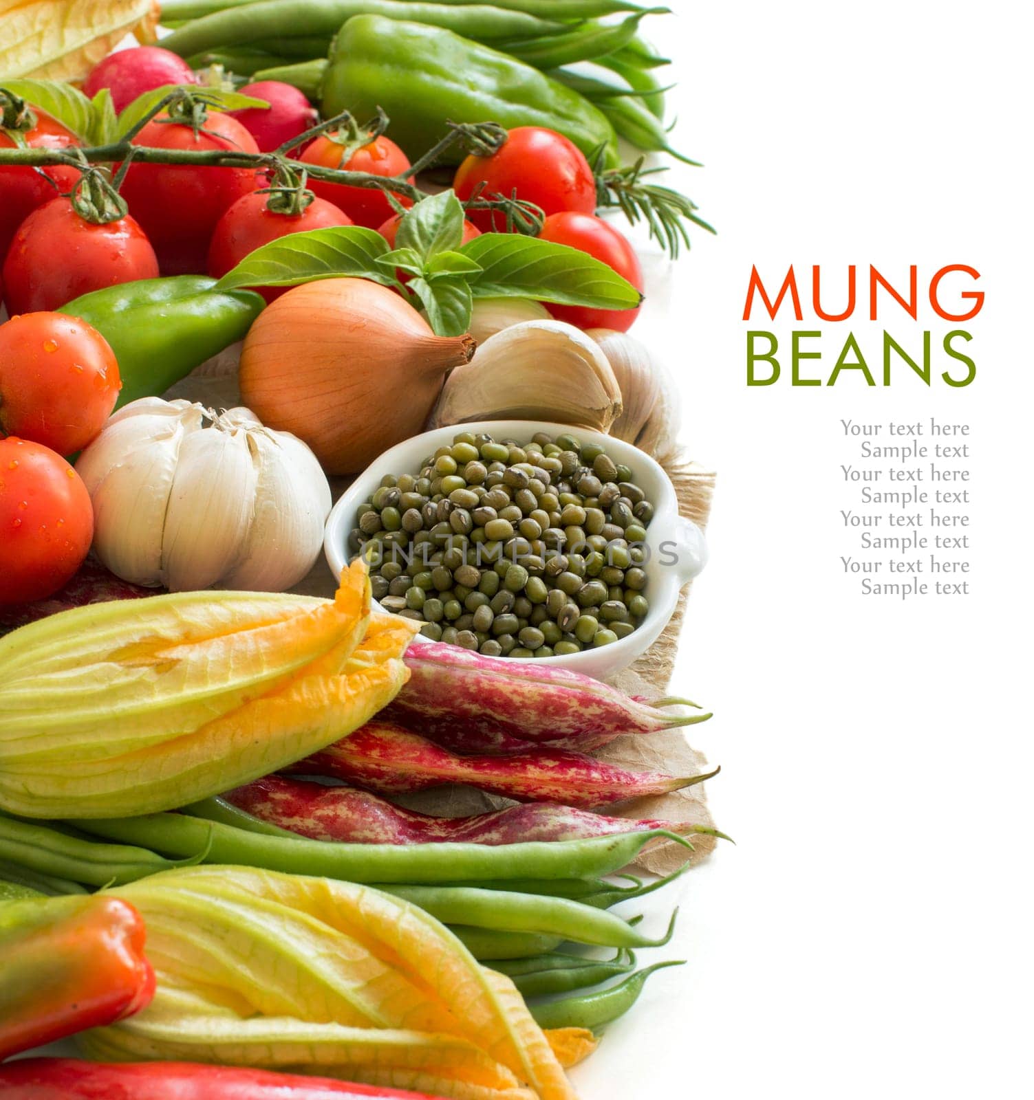 Raw organic mung beans in a bowl and vegetables isolated on white