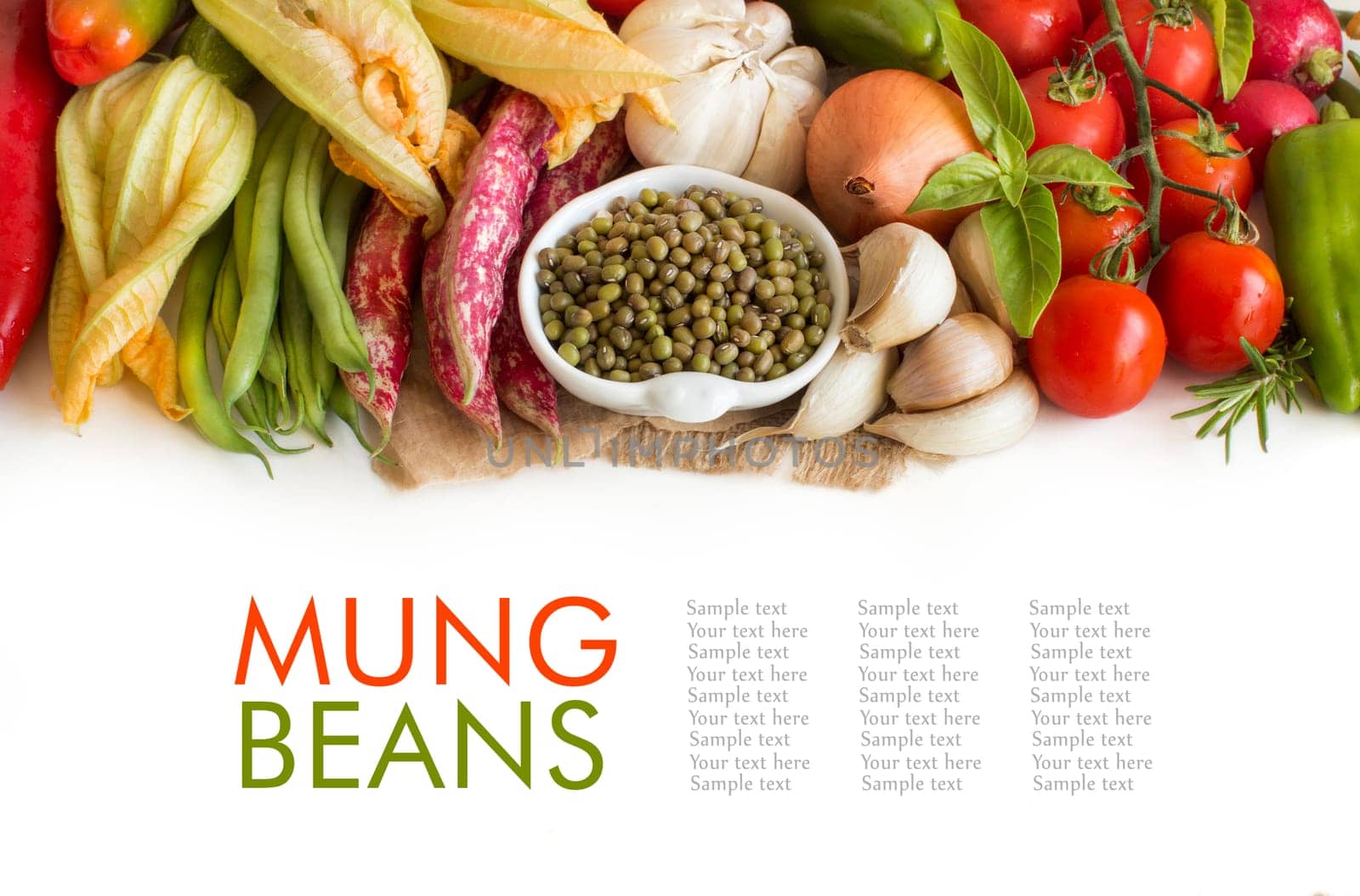 Raw organic mung beans in a bowl and vegetables isolated on white
