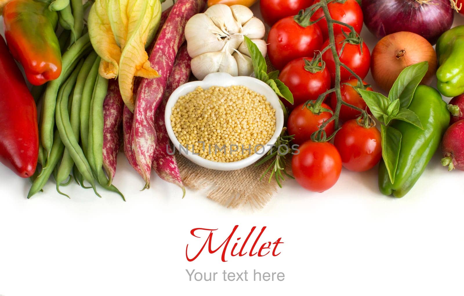 Raw millet in bowl and vegetables isolated on white