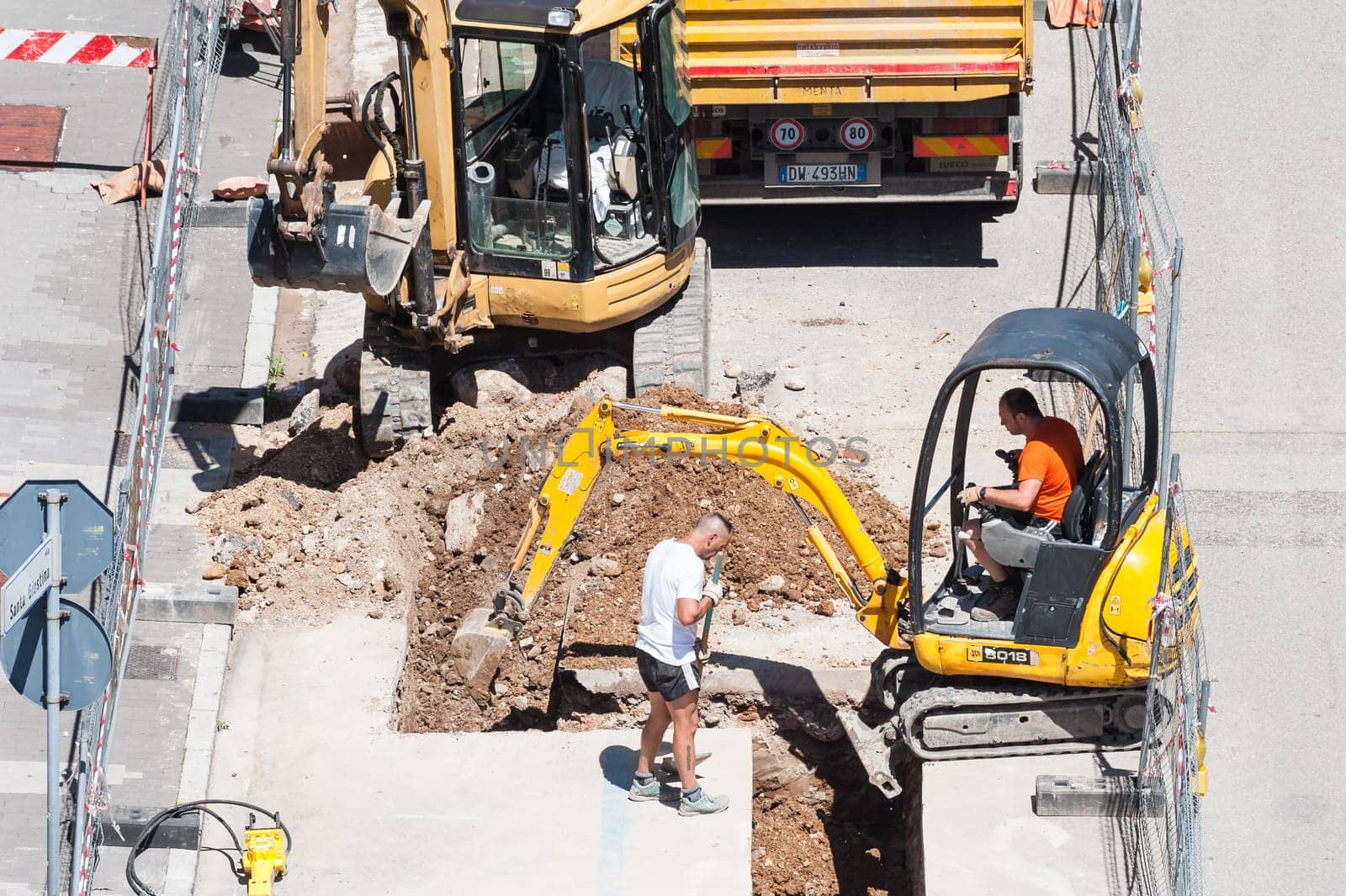 Udine,Italy - June 28 2016 : Excavation for the laying of sewerage pipes