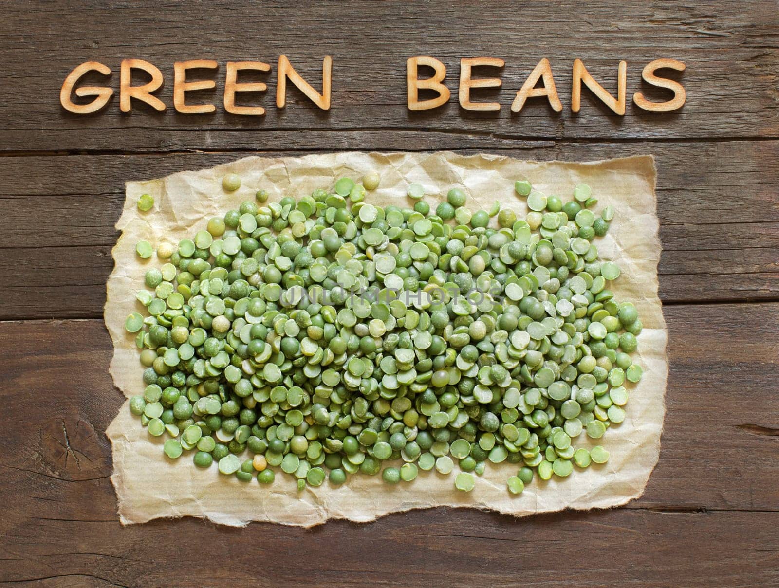 Dried Green Split Peas with a wooden word