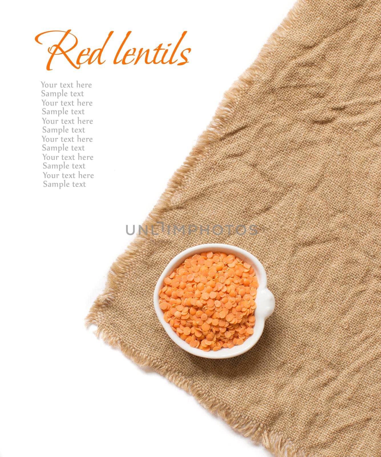 Red lentils in a bowl on burlap isolated on white