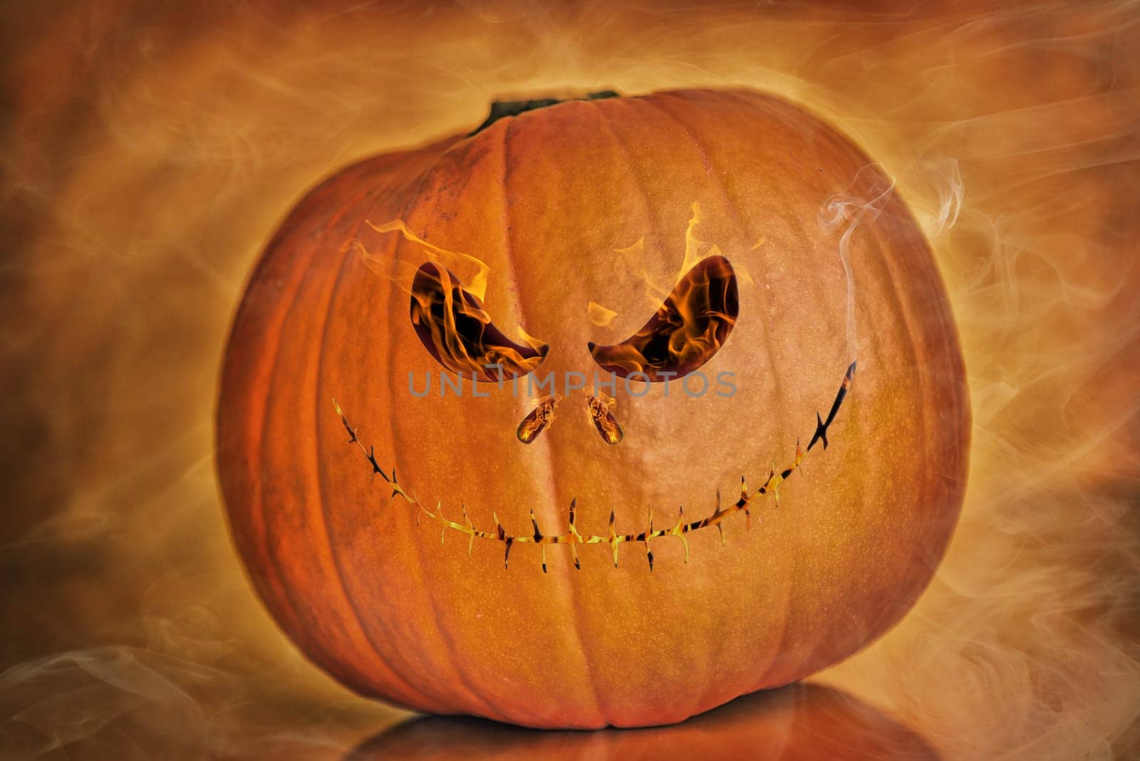 dark background pumpkin on orange background,halloween theme