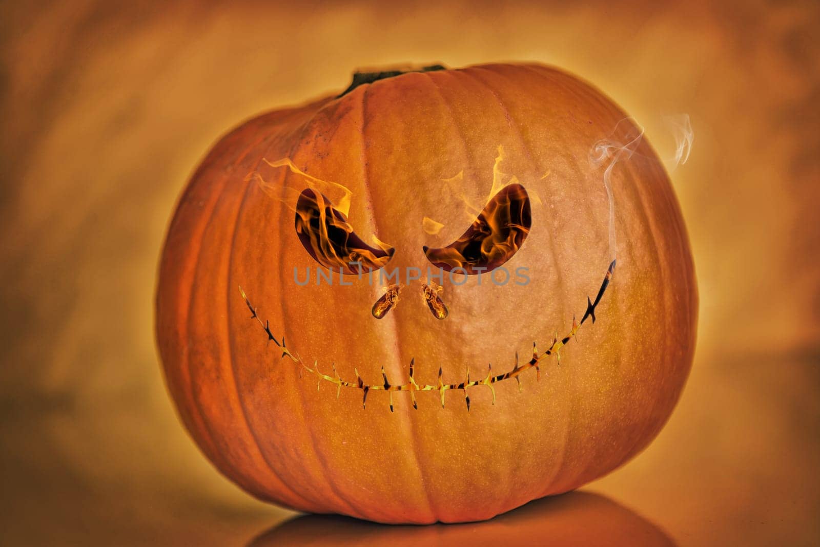 dark background pumpkin on orange background,halloween theme
