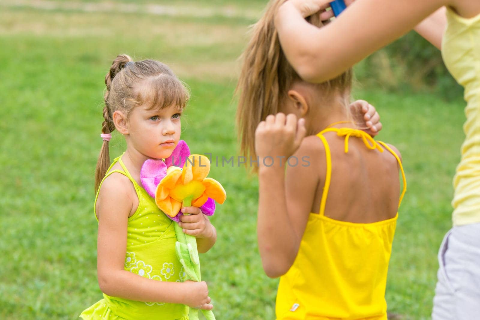 The girl looks like my mother braids her sister