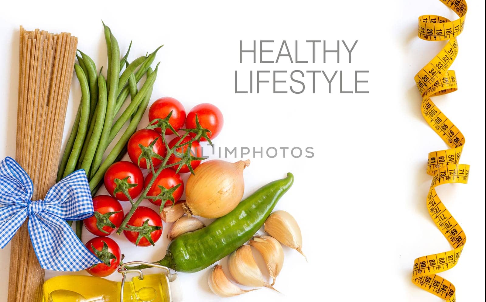 Italian Pasta with tomatoes, green beans, onion, garlic and olive oil on a white background (with space for text)