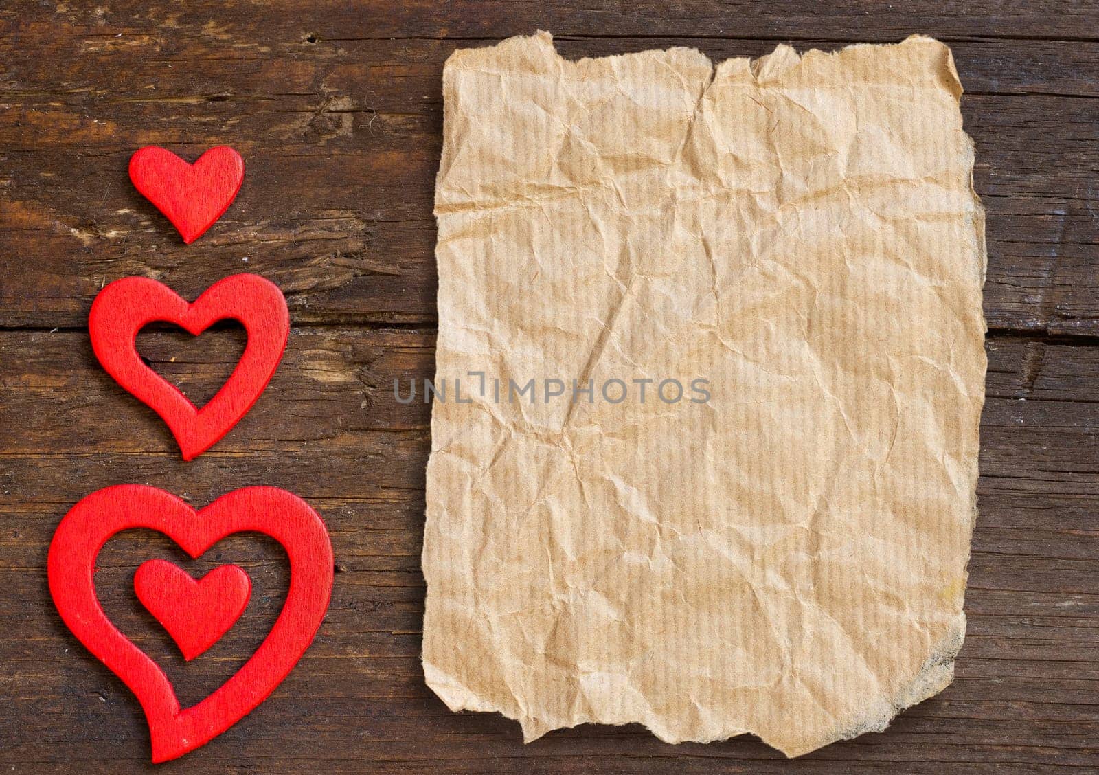 Rustic hearts on a old wooden background