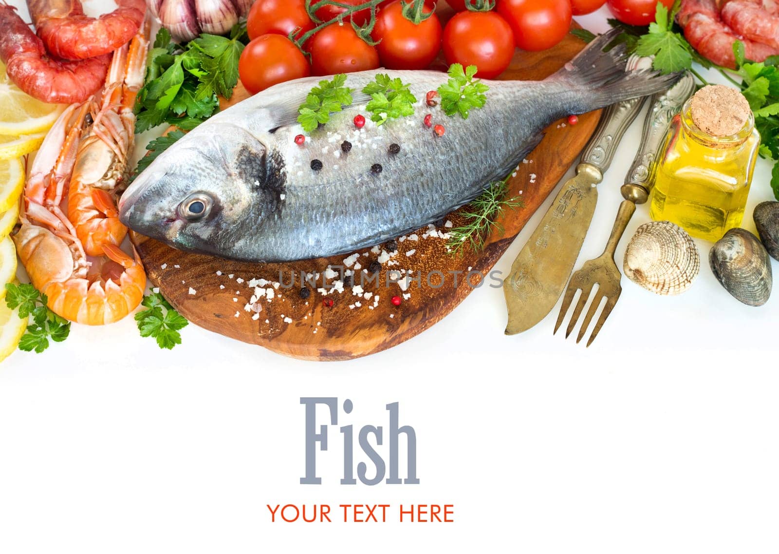 Fresh dorado fish, seafood and vegetables on a white background