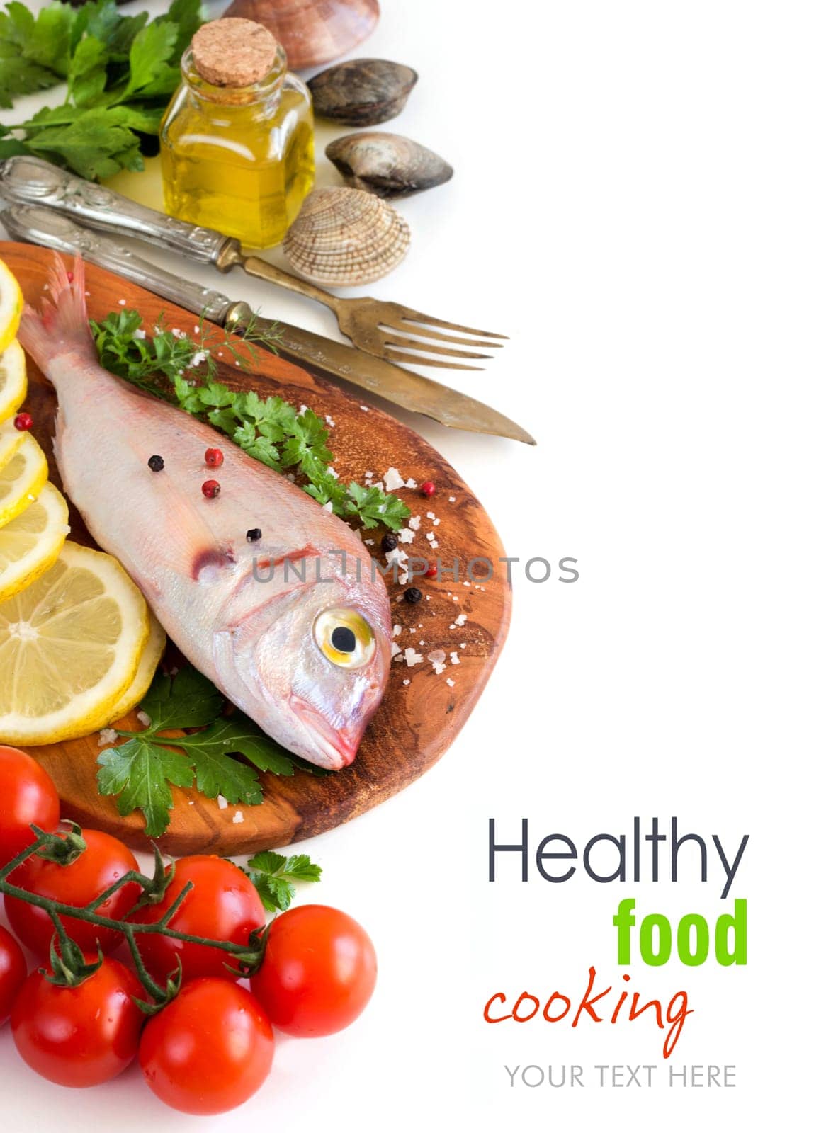 Fresh fish on a wooden board isolated on white