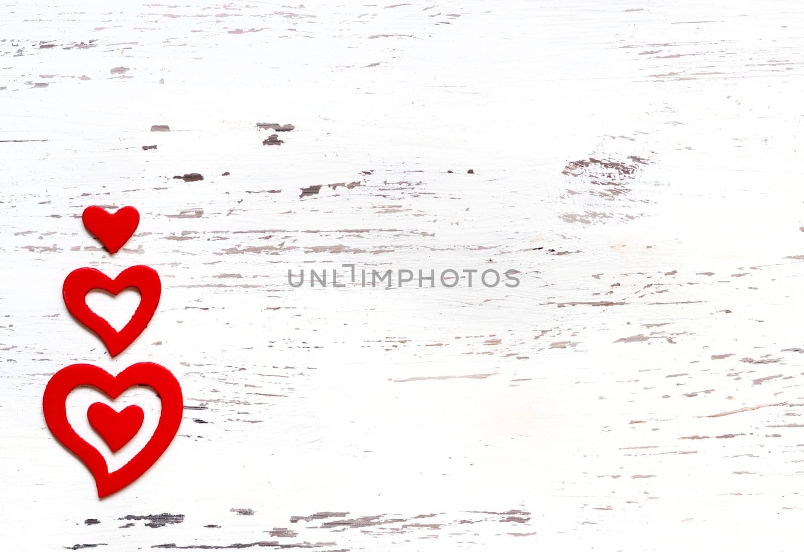 Rustic hearts on a white shabby chic background
