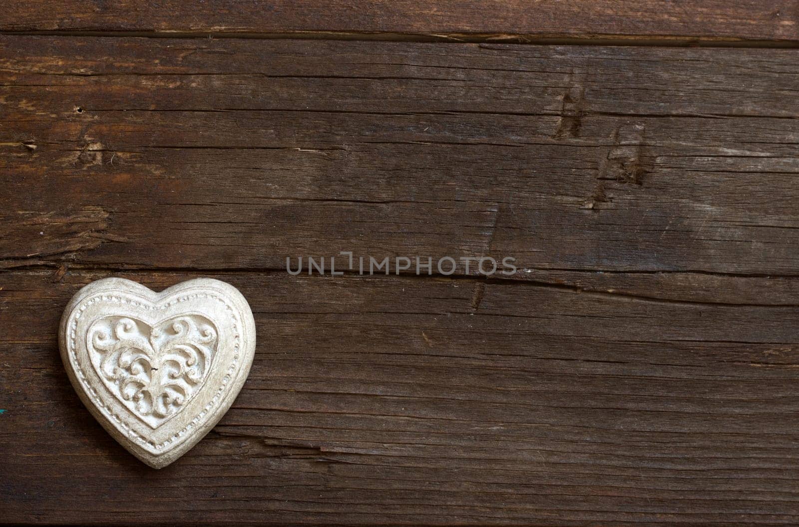 Rustic heart on a old wooden background