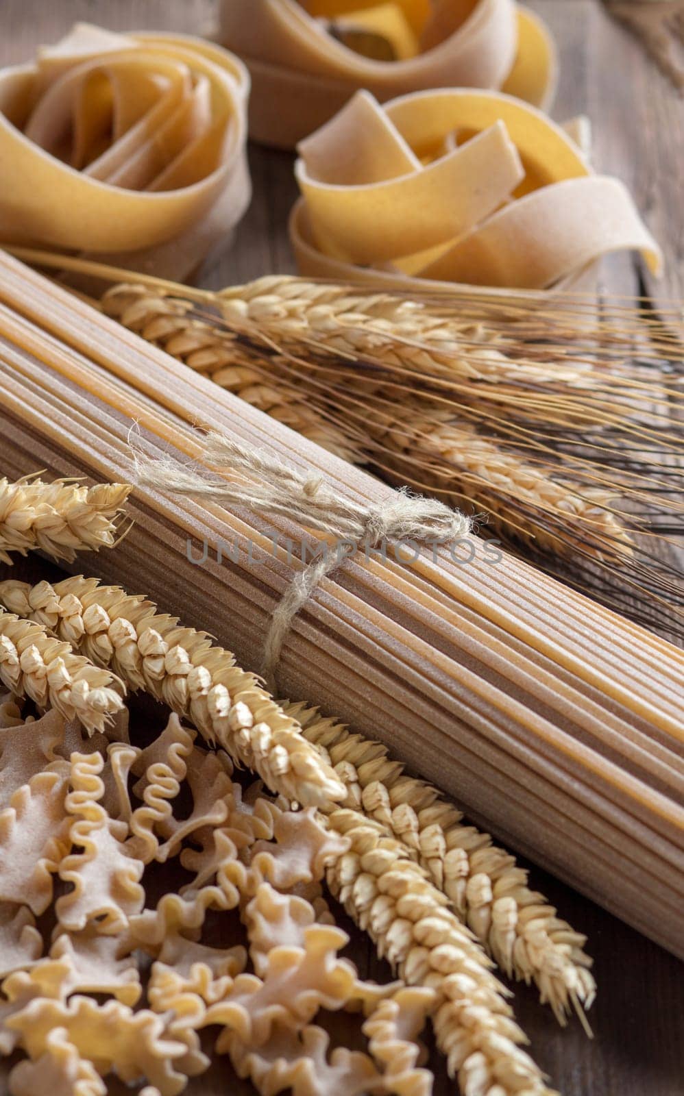 Whole wheat italian pasta with spikes close up