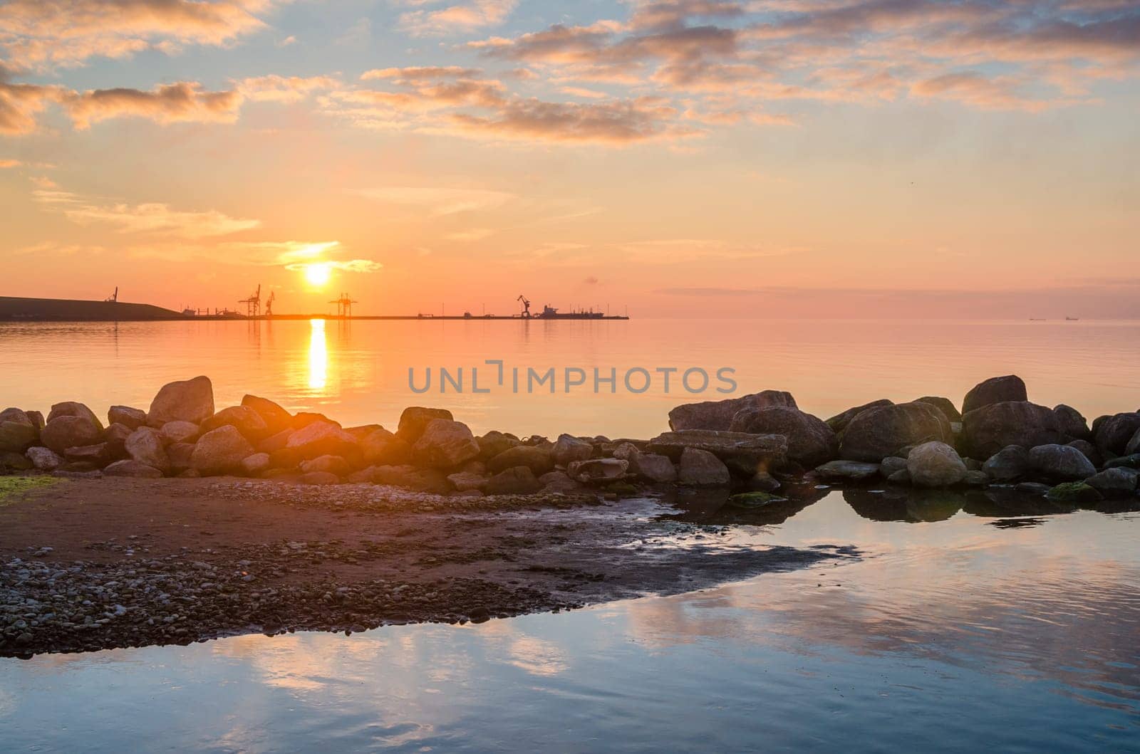 Beautiful sunset on the sea, a type on port
