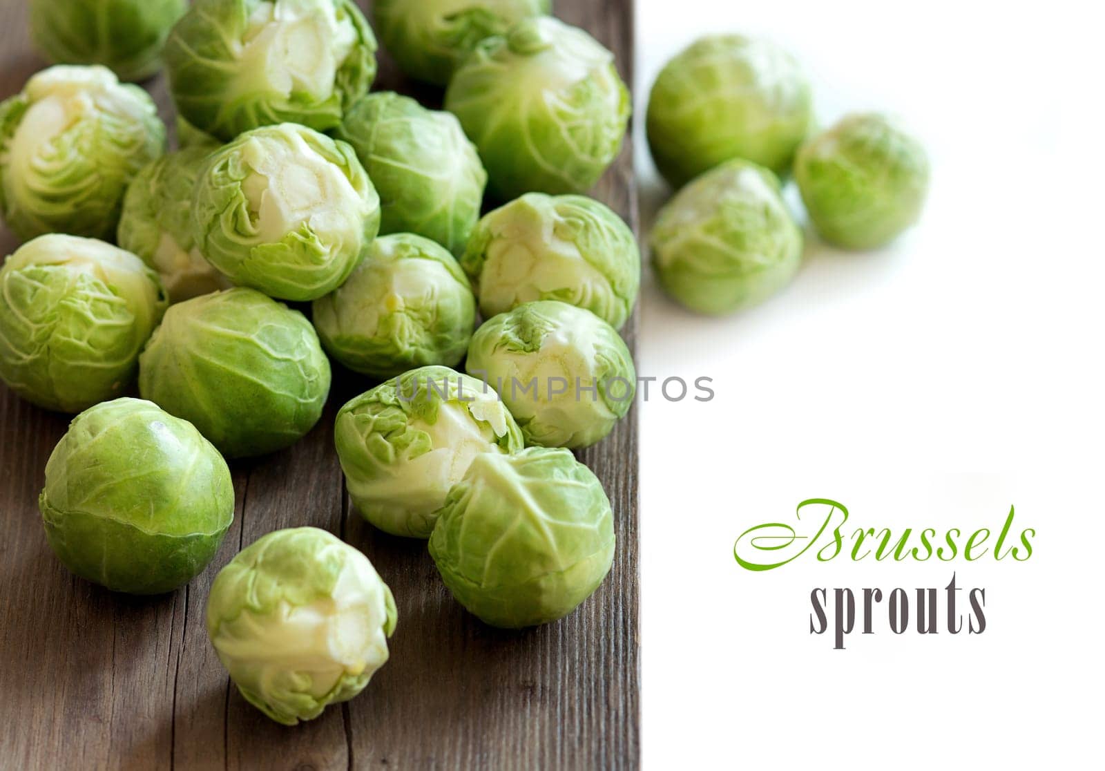 Brussels sprouts on an old wooden table border