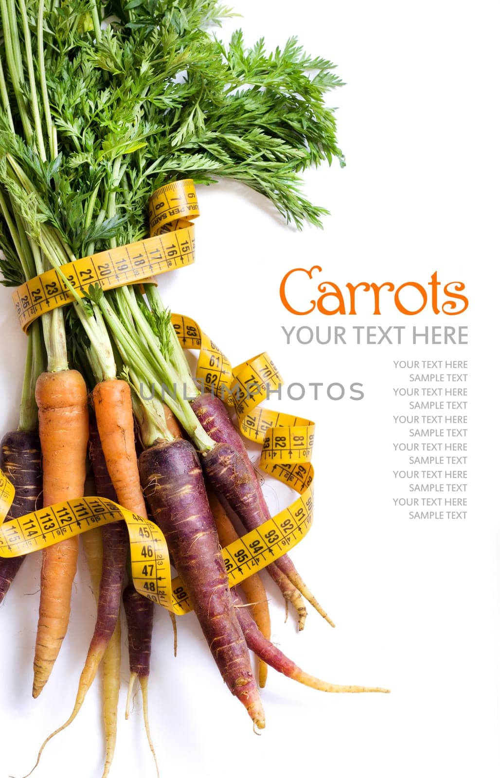 Fresh organic rainbow carrots and yellow measuring type