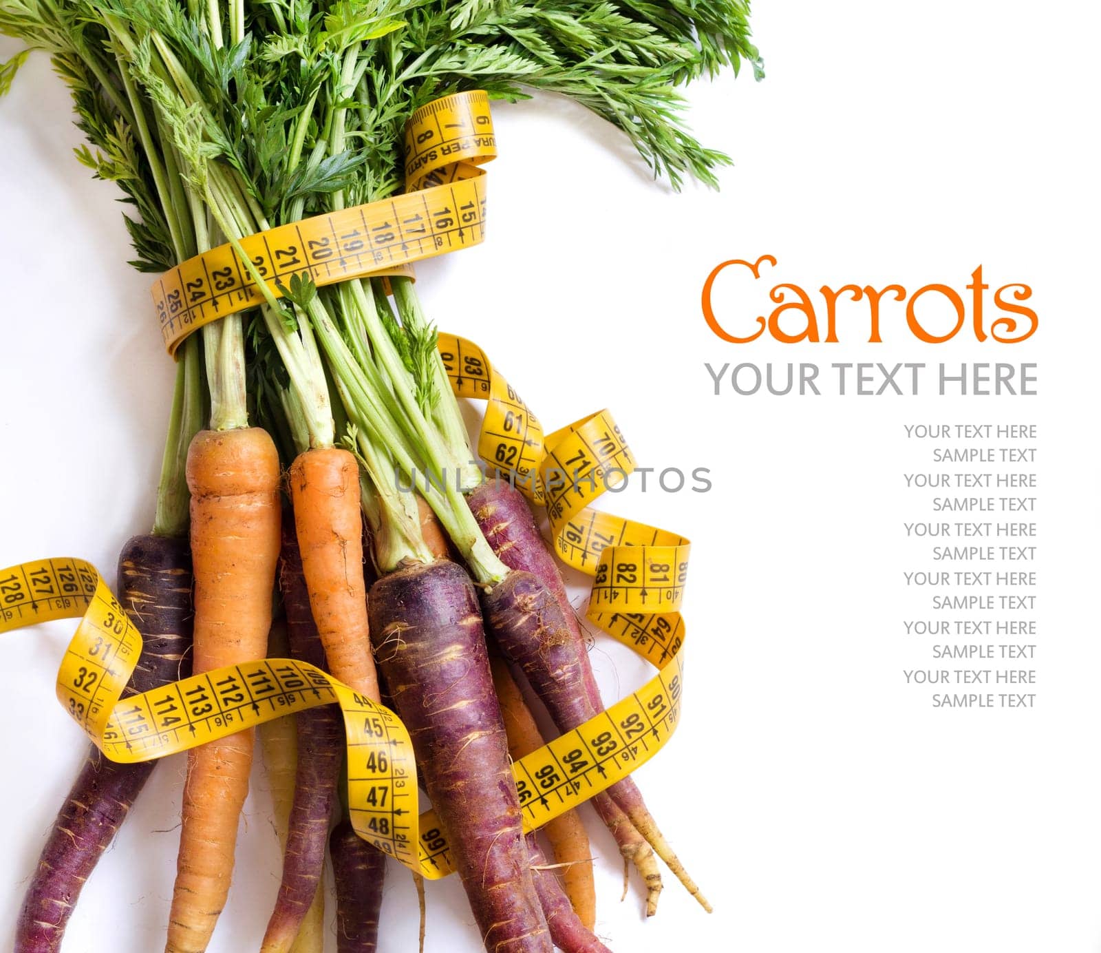 Fresh organic rainbow carrots and yellow measuring type