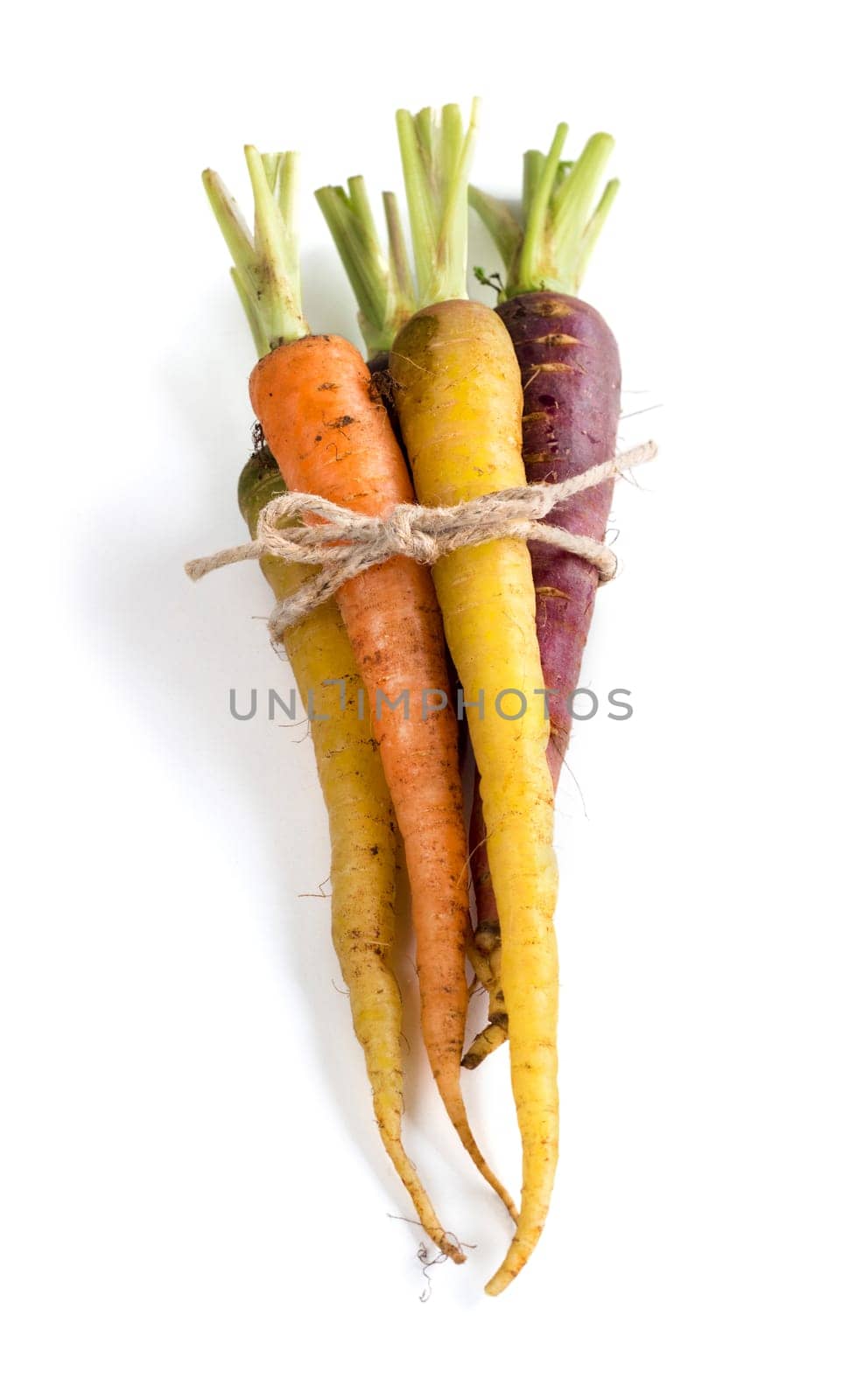 Bunch of fresh organic rainbow carrots isolated on white