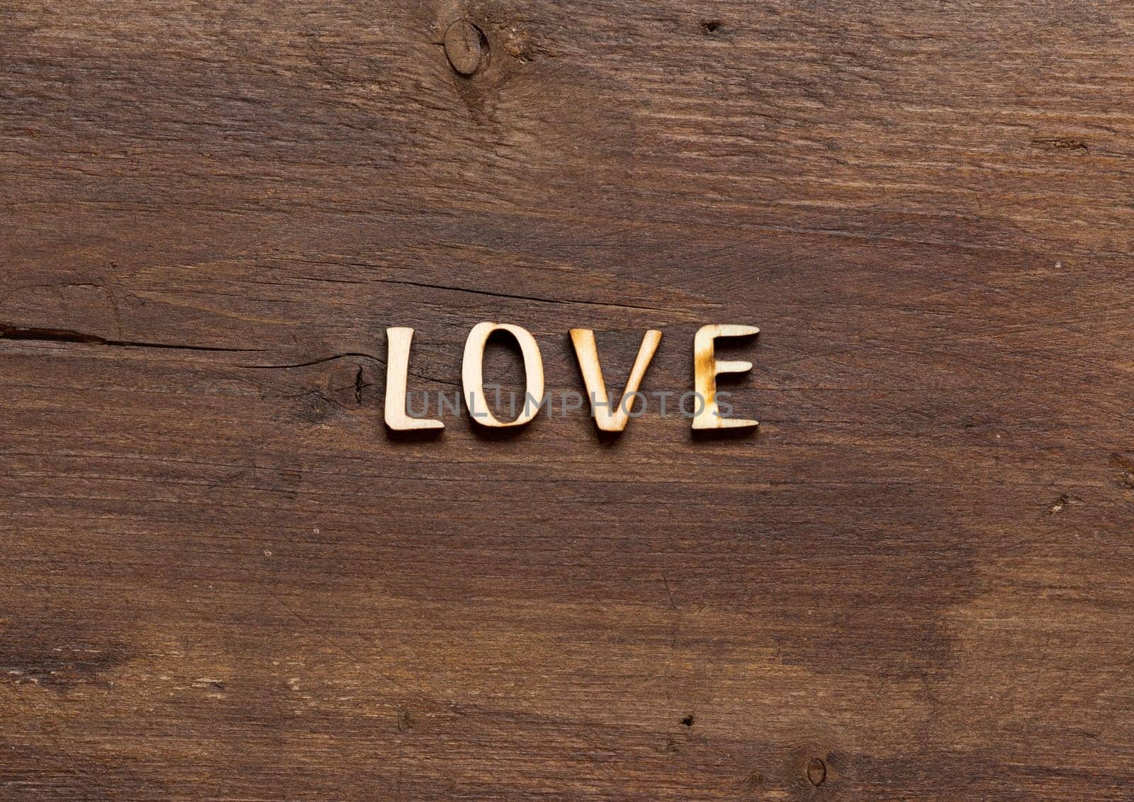 The word of Love on wooden background