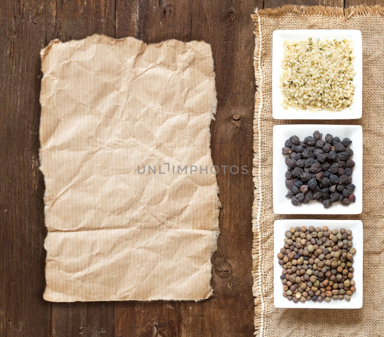 Legumes in bowls on a wooden table