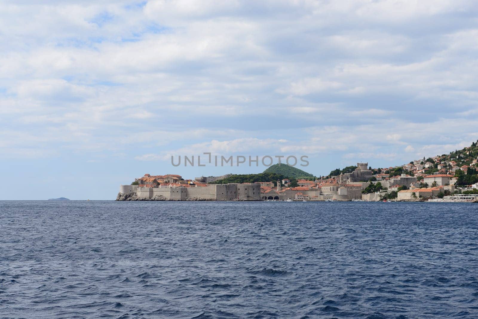 View of Dubrovnik old town from Adriatic sea (Croatia). Space for text up and button.
