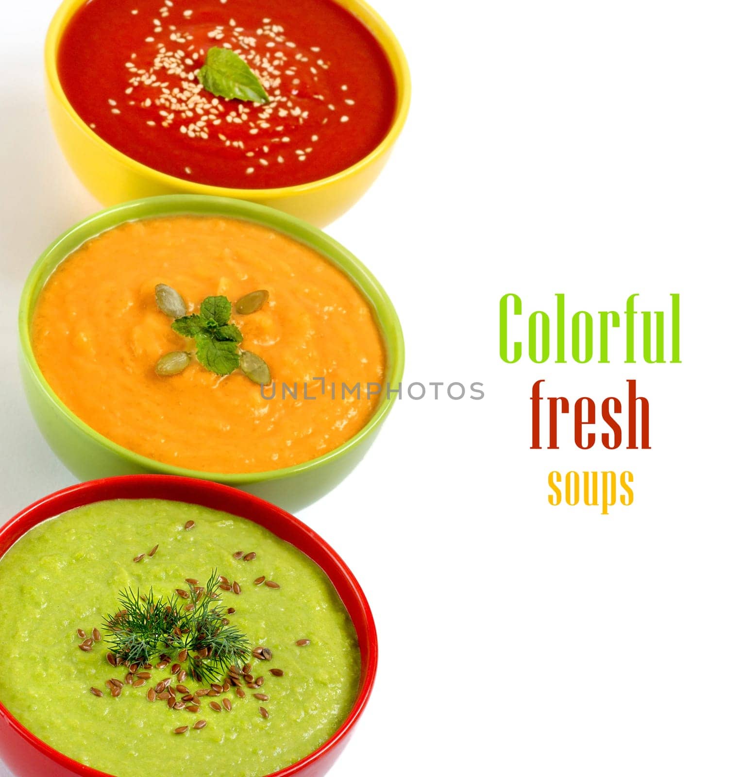 Three fresh soups - tomatoe, pumpkin and green peas soups.