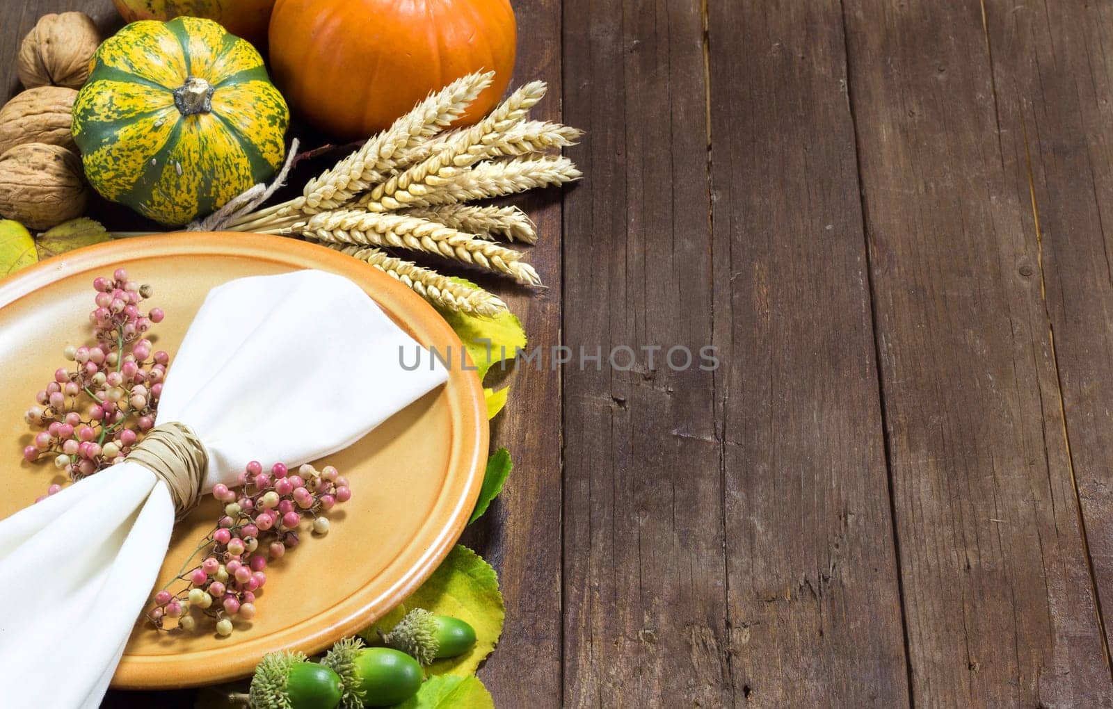 Rustic autumn table setting on a wooden table