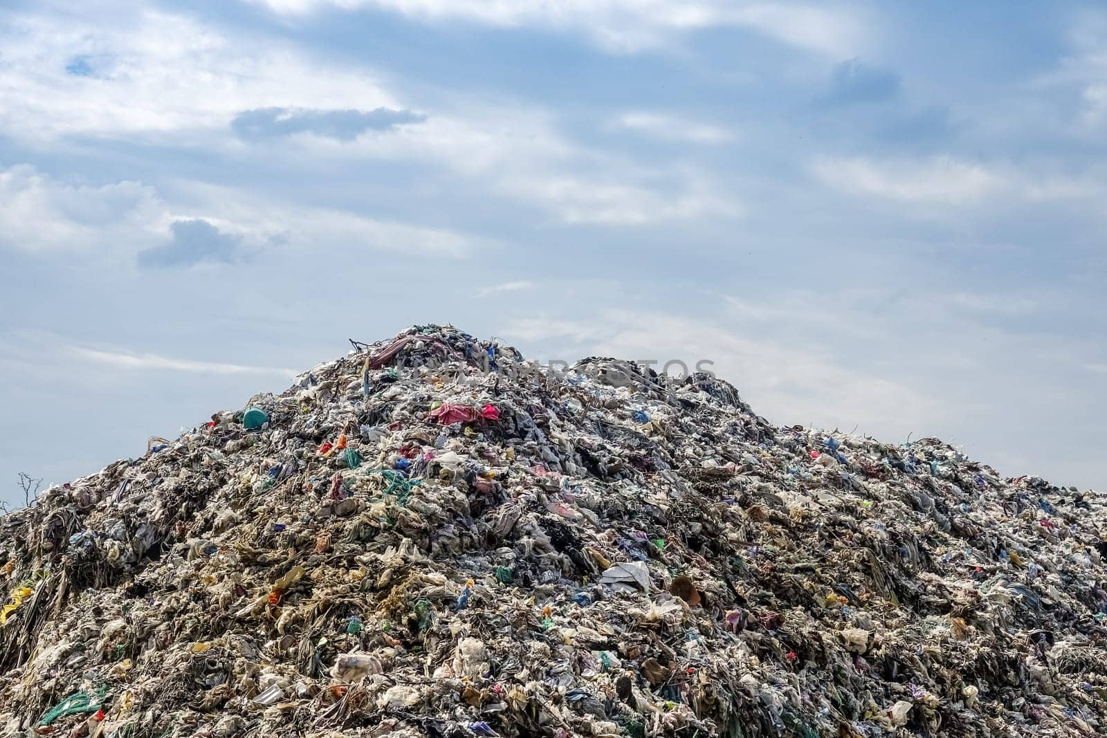 Landfill,storage of garbage on a dump with a blue sky