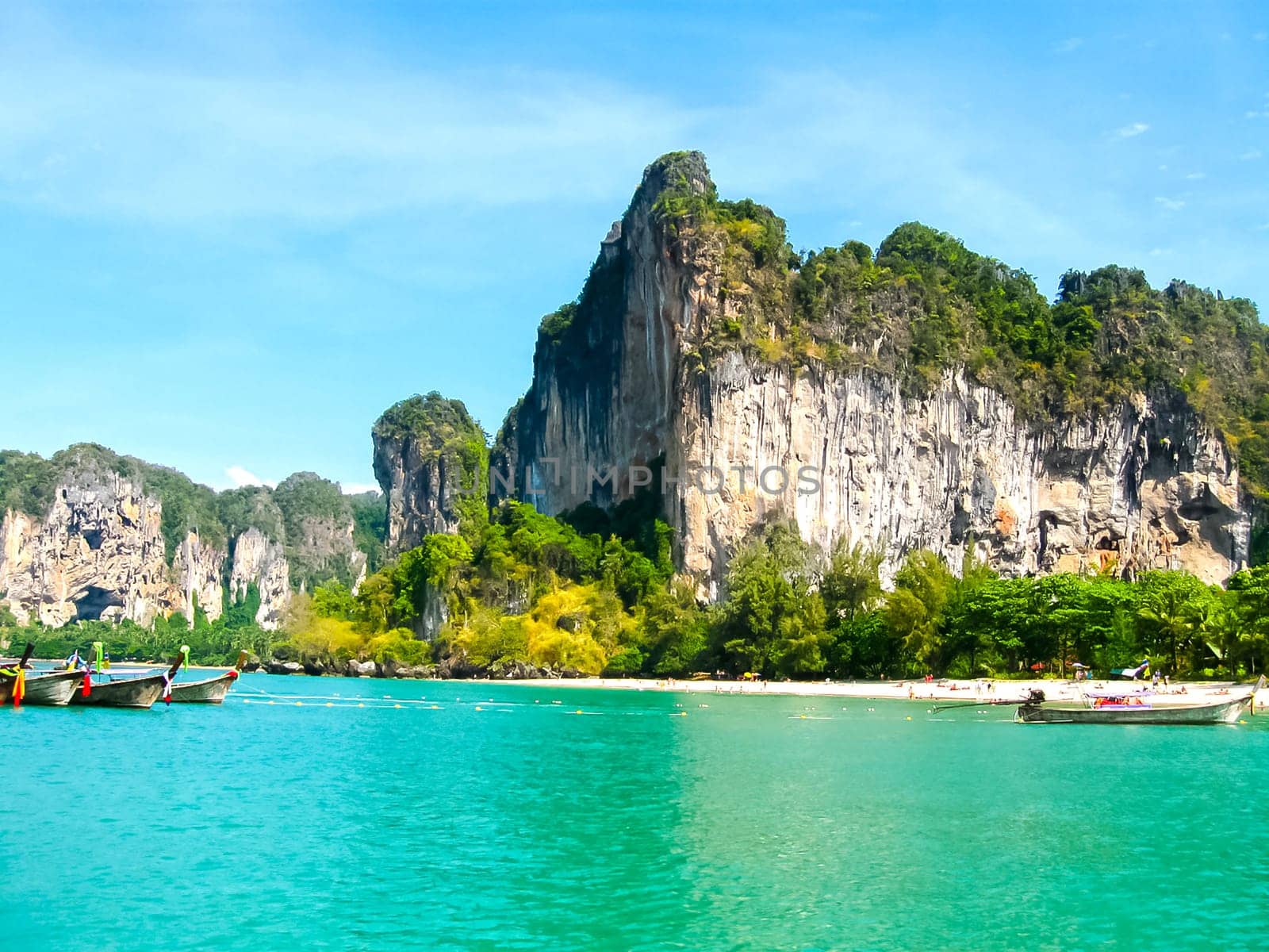 The tropical landscape. Railay, Krabi, Thailand. View of the rock and boat