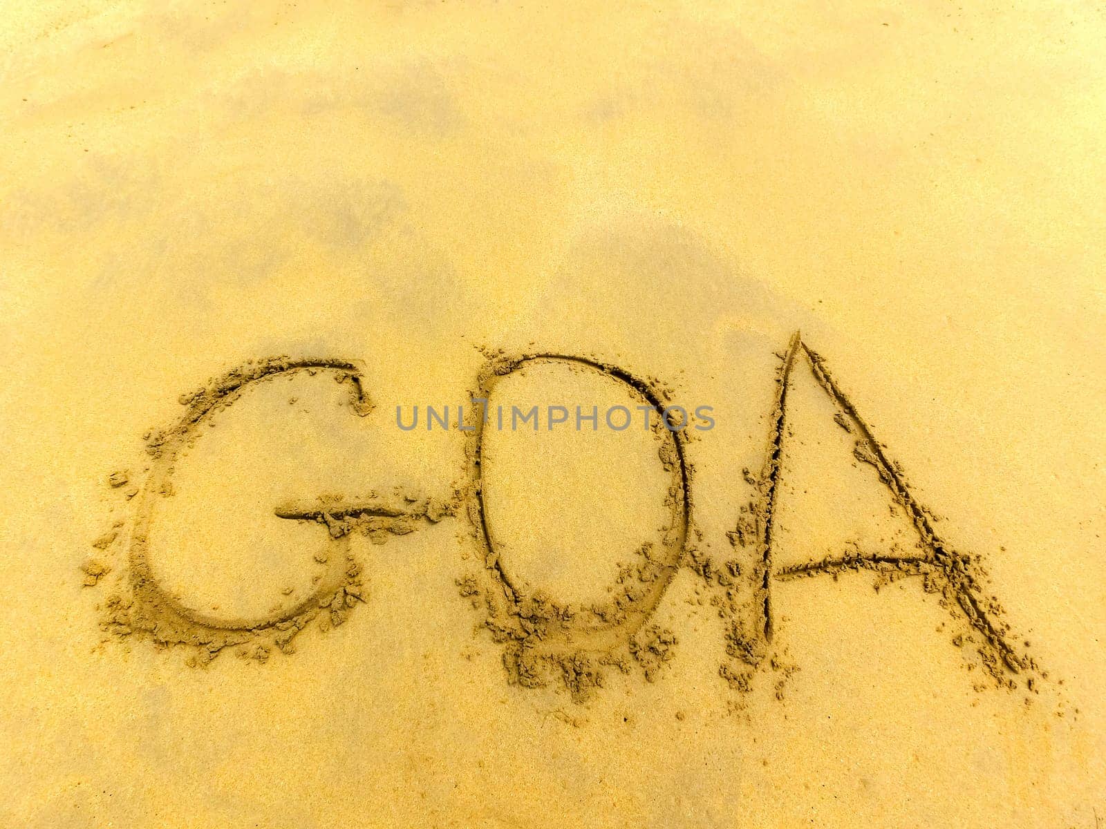 The inscription on and from the sand Goa .
