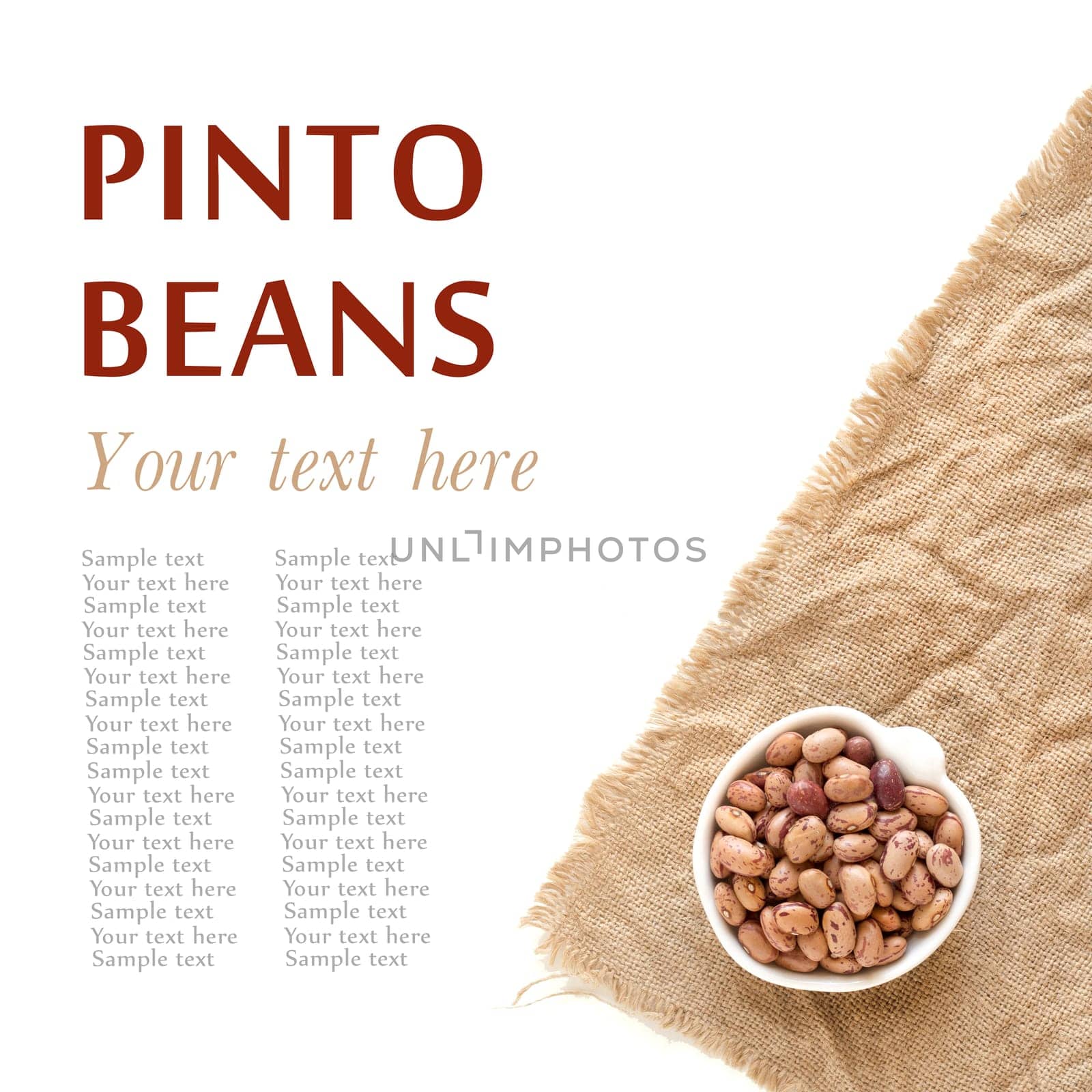 Raw pinto beans in a bowl on burlap