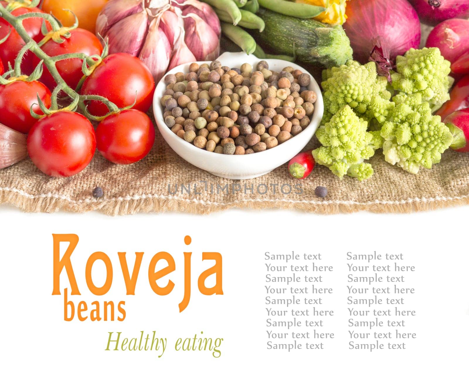 Raw organic roveja beans and vegetables isolated on white