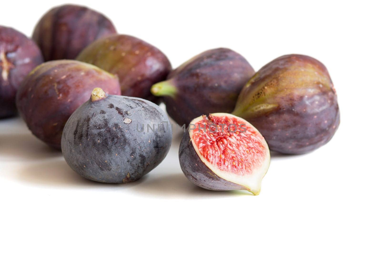Fresh fruits - figs isolated on white background