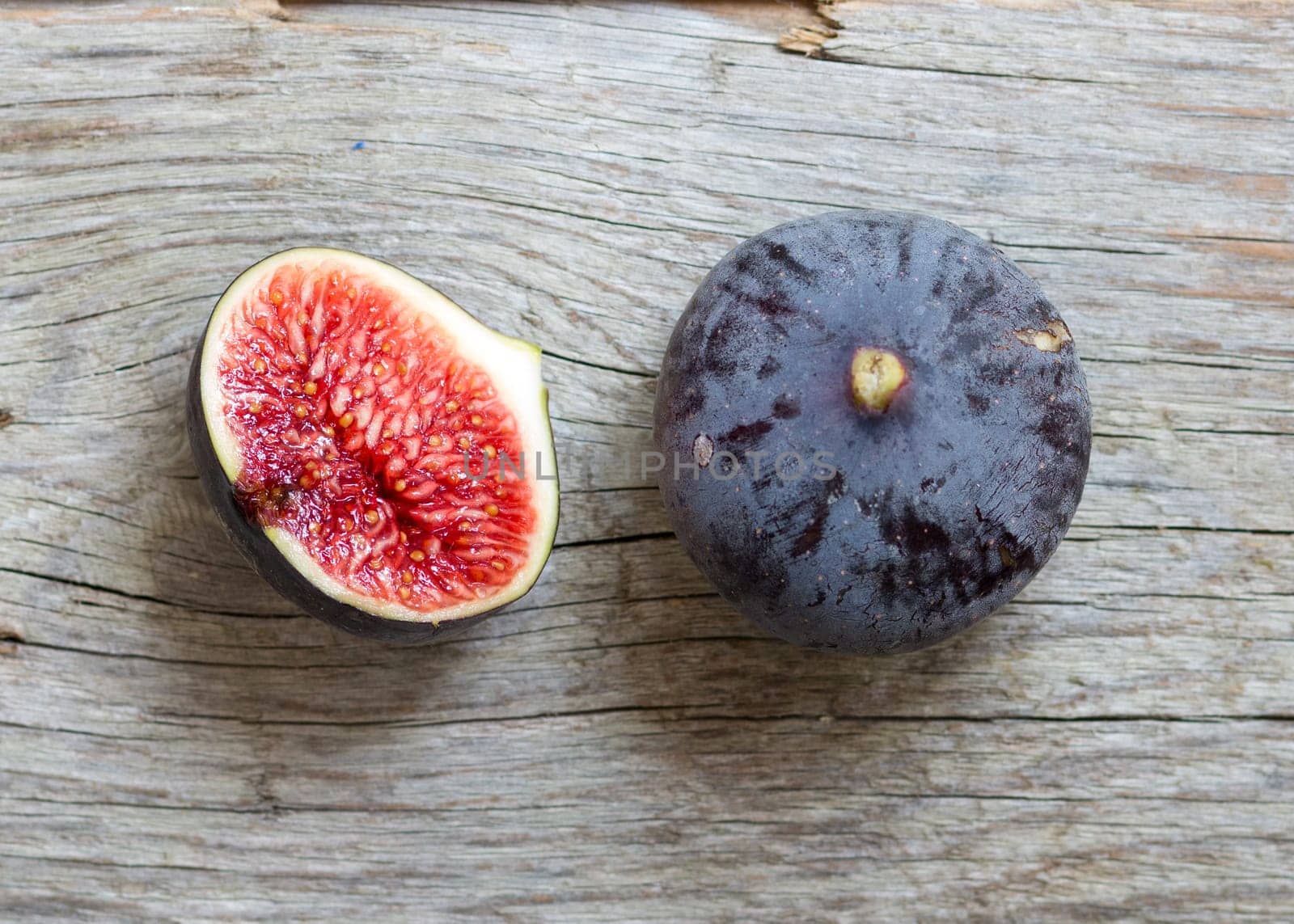 Fresh fruits - figs on the wooden table