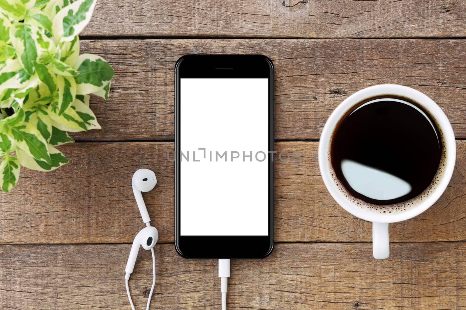 smartphone white screen on wooden table, mockup modern smartphone jet black color