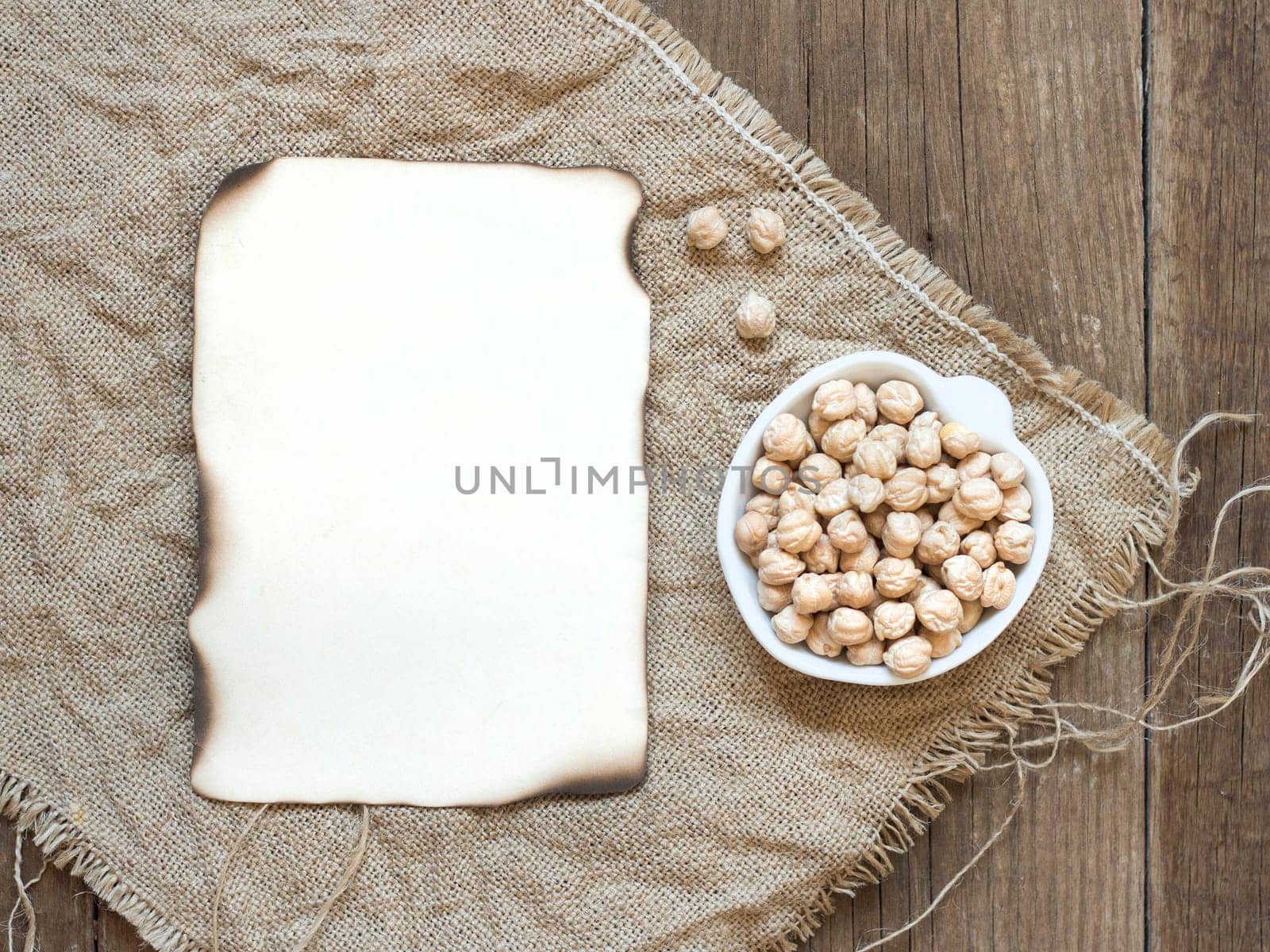 Raw Organic chickpea in a bowl on wooden table