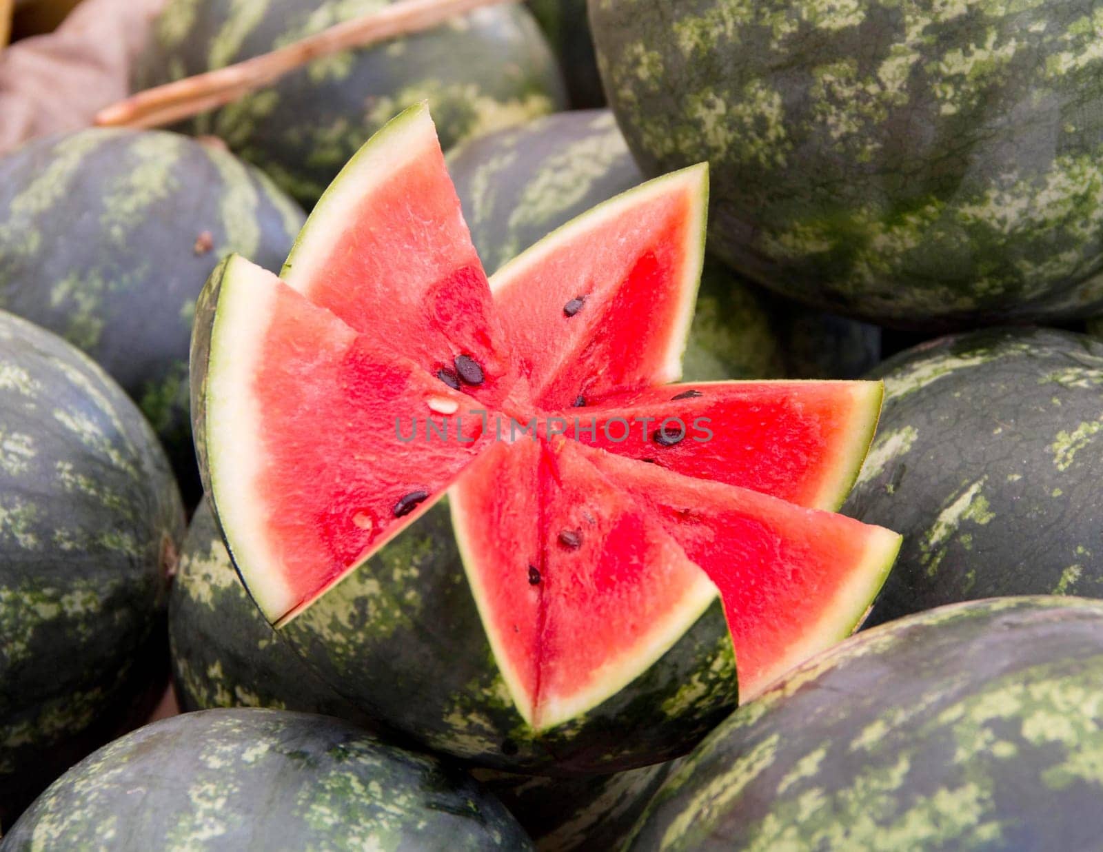 Open watermelon on a market