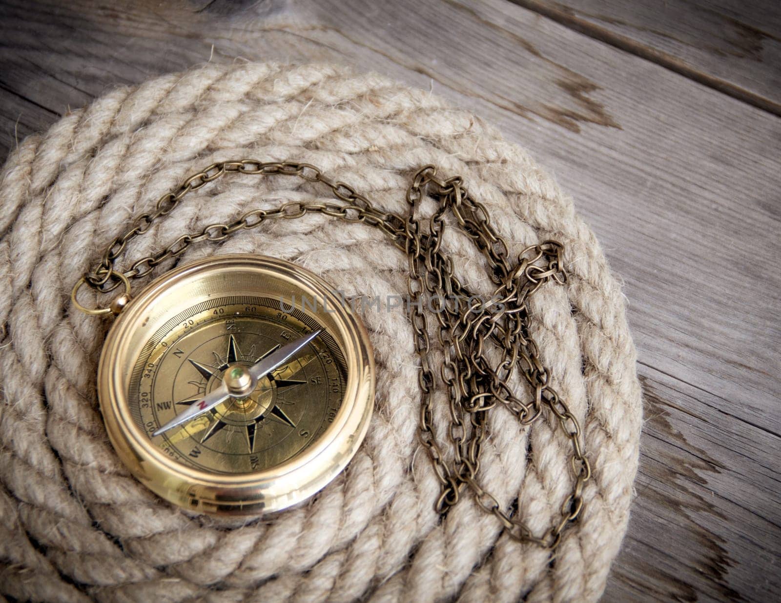Antique compass and rope