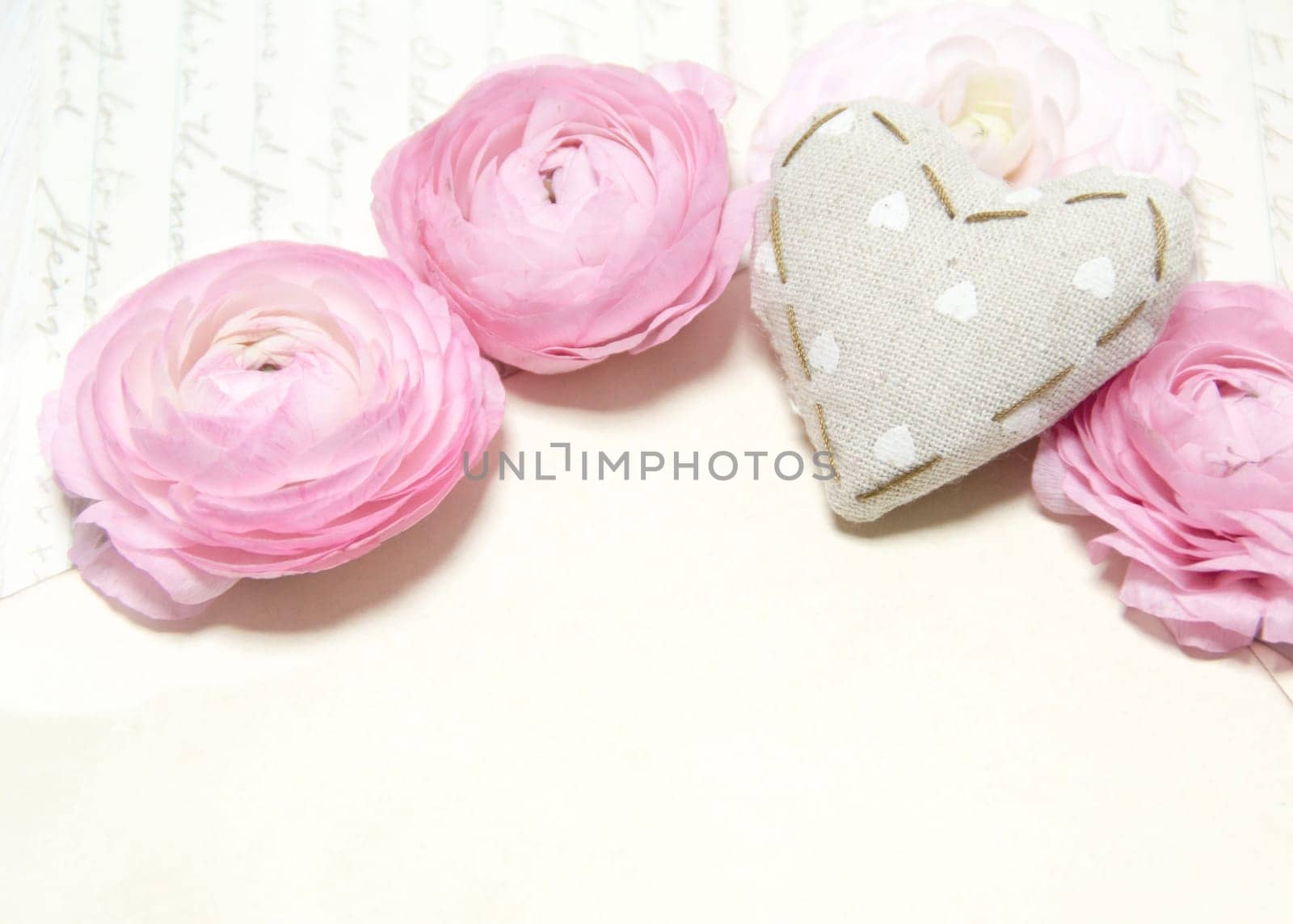 Ranunculus flowers and heart