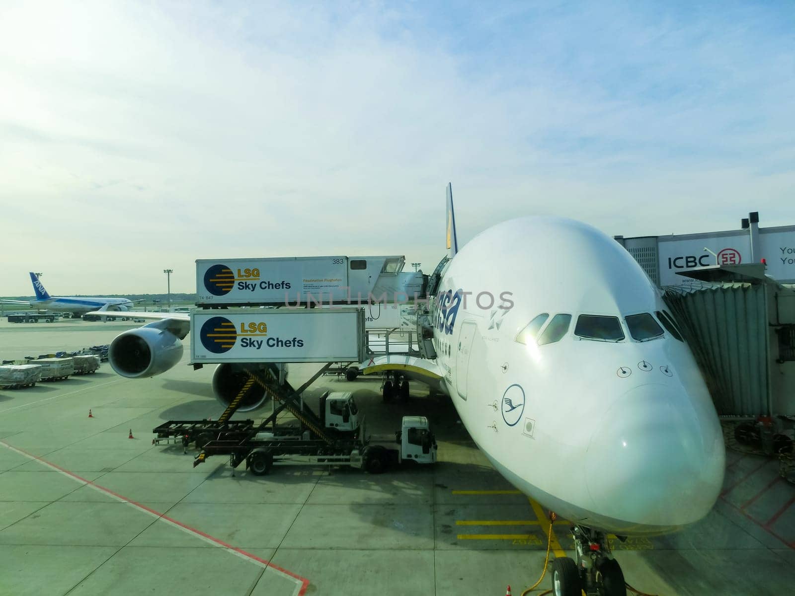 Frankfurt am Mine, Germany - April 30, 2016: Aircraft standing near the terminal at Frankfurt am Main airport. It is a one of the busiest airport in Europe.